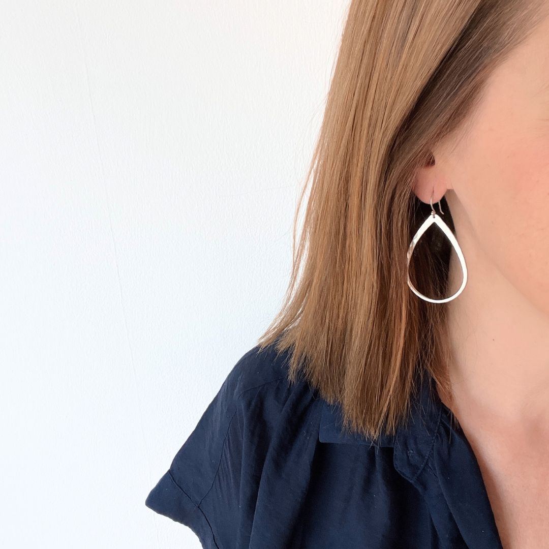 Hammered Tear Drop shaped earring in silver